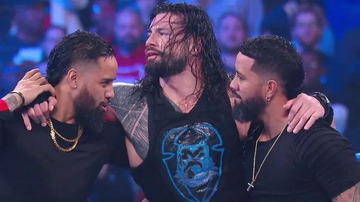 Roman Reigns with The Usos