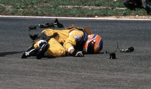 Martin Donnelly lies on the track