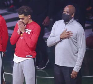 Trae Young and Nate McMillan