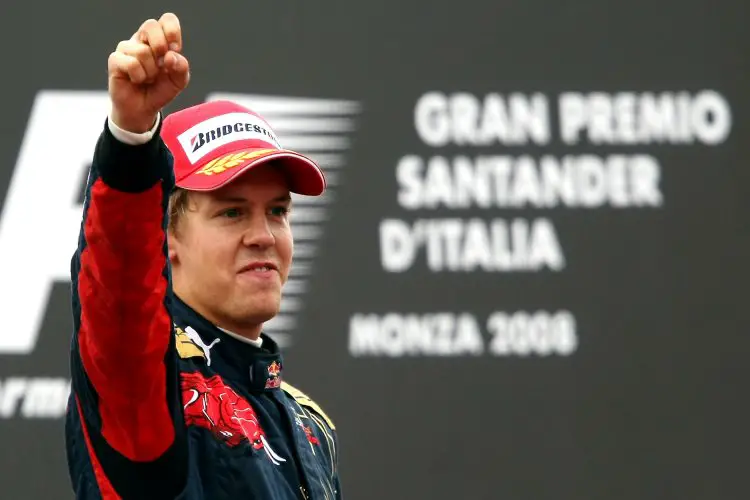 Vettel celebrates his first victory Monza F1 2008 on podium Toro Rosso Ferrari Foto Red Bull
