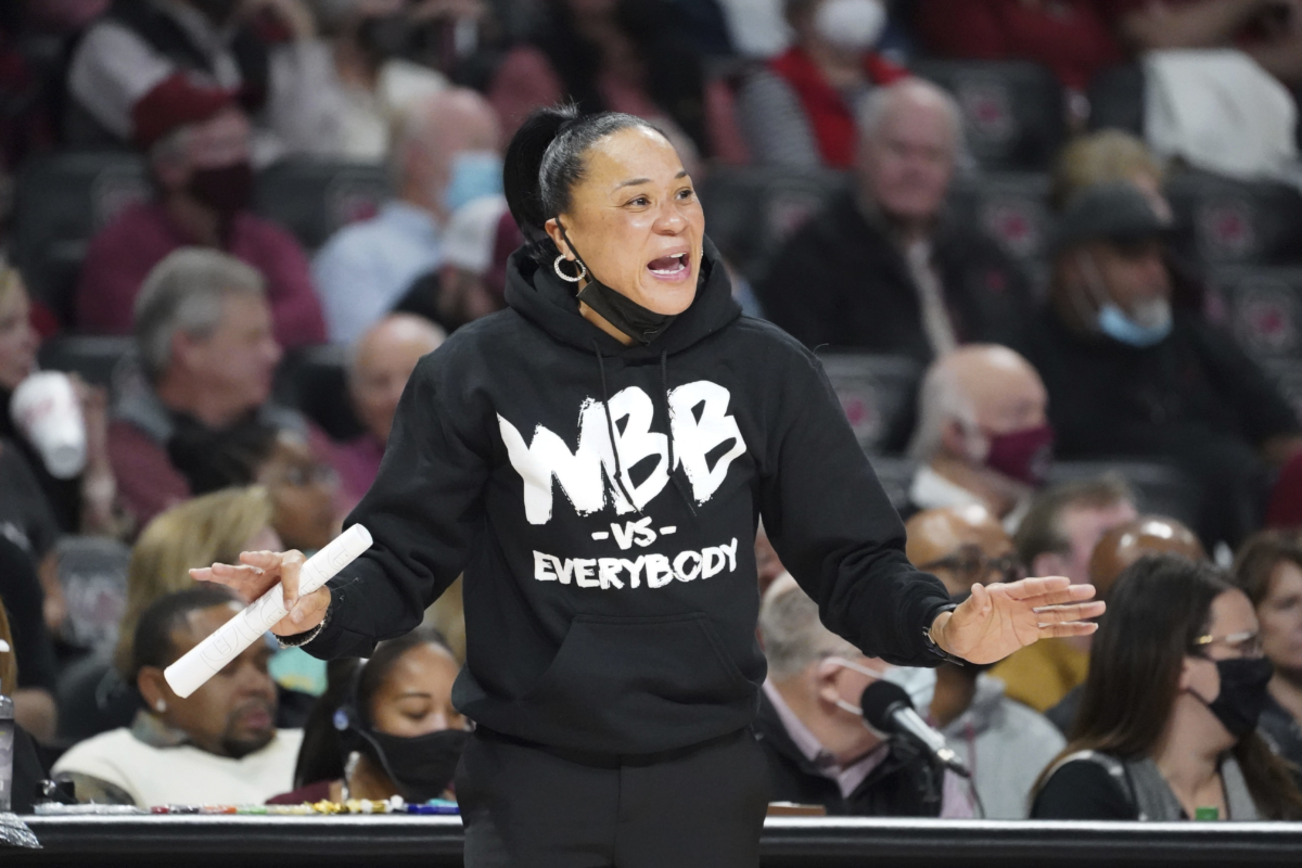 South Carolina coach Dawn Staley and assistant coaches Lisa Boyer