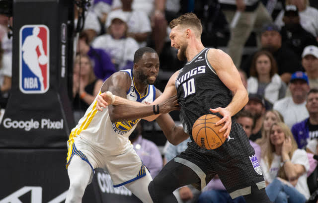 Draymond Green and Domantas Sabonis