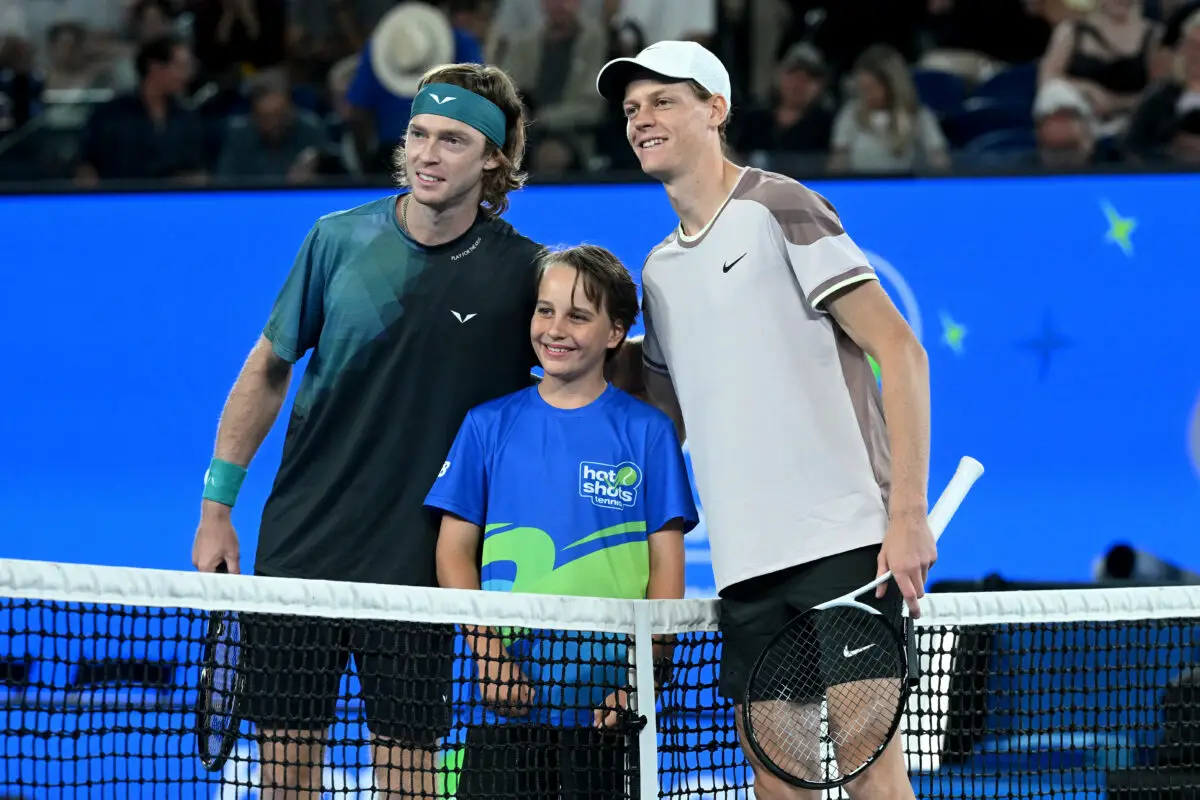  Jannik Sinner and Andrey Rublev share high-five ahead of Australian Open clash